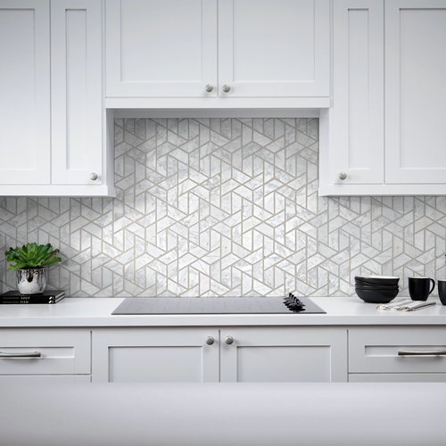 white tile backsplash behind oven in kitchen