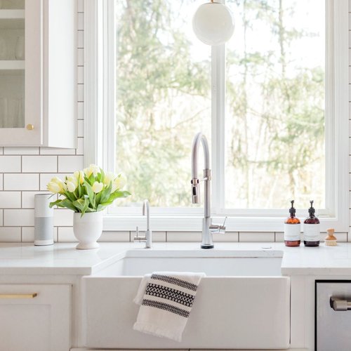 Bright kitchen with white tiled backsplash from 180 Degree Floors in the Nashville, TN area