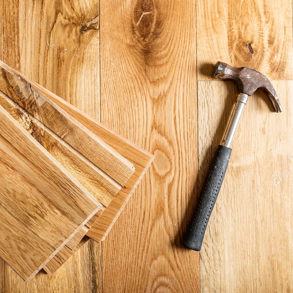Hammer on hardwood planks - Hardwood flooring installation services from 180 Degree Floors in the Nashville, TN area